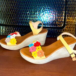 Stunning beautiful Italian sandals. Colorful Suede flowers.Excellent condition